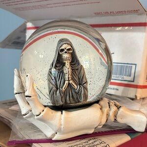 Skeleton Hand Snow Globe